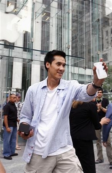 Vincent showing off the Apple iPhone